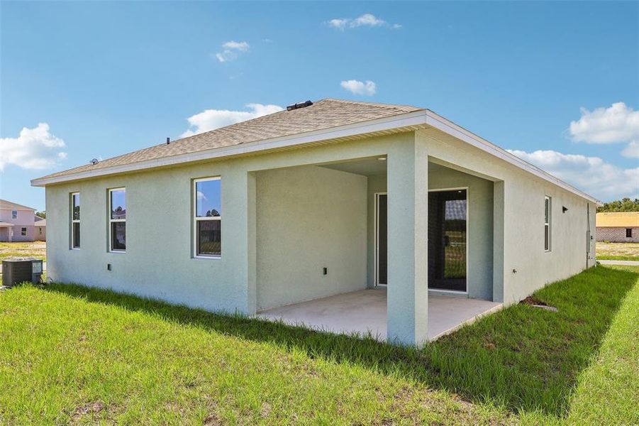 Exterior details and patio area of a home in Brack Ranch, St. Cloud (Image 20).