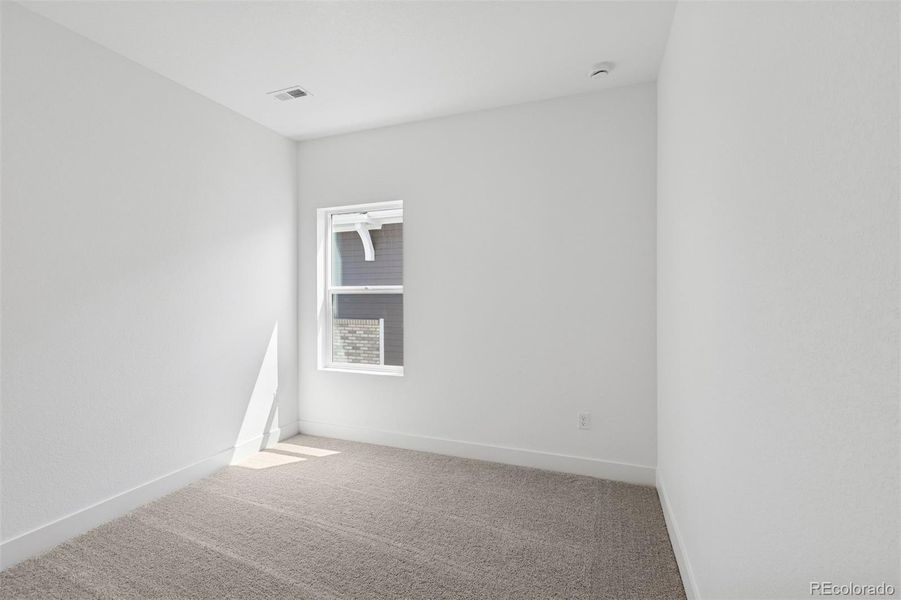 Spacious, unfurnished interior of a new home in Painted Prairie Cottage, Aurora (Image 36).