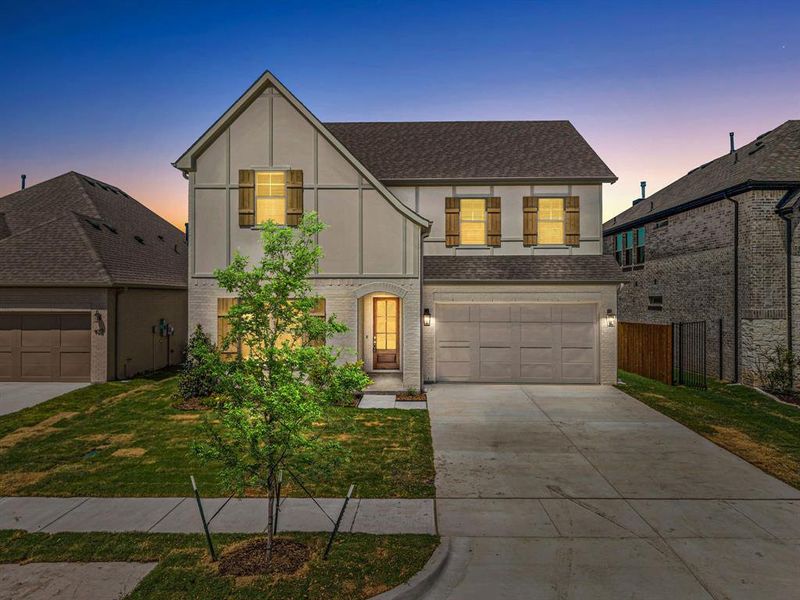 Front exterior of a new home in The Bluffs at Parks of Aledo, Aledo, TX, highlighting curb appeal (Image 20).