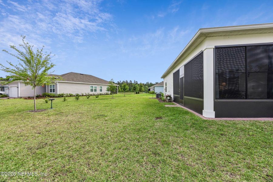Exterior details and patio area of a home in , Yulee (Image 29).