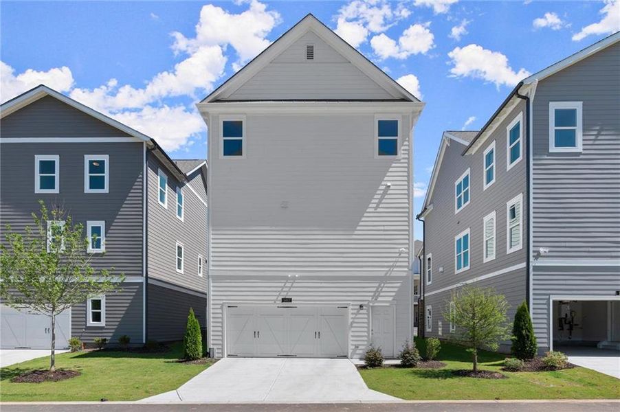 Front exterior of a new home in West Town, Atlanta, GA, highlighting curb appeal (Image 25).