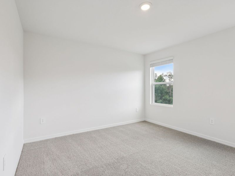 Spacious, unfurnished interior of a new home in Cagan Crossings West, Clermont (Image 10).