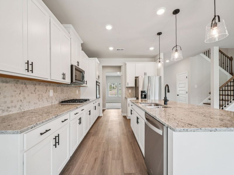 Furnished interior view inside a new home in Vines at Mill Creek - Estate Series, Braselton (Image 7).