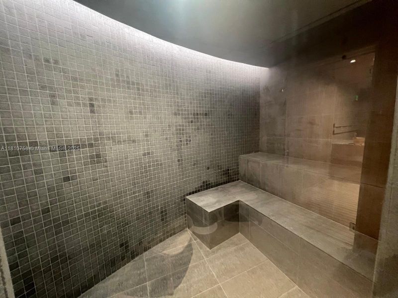 Spacious, unfurnished interior of a new home in Aston Martin Residences, Miami (Image 21).