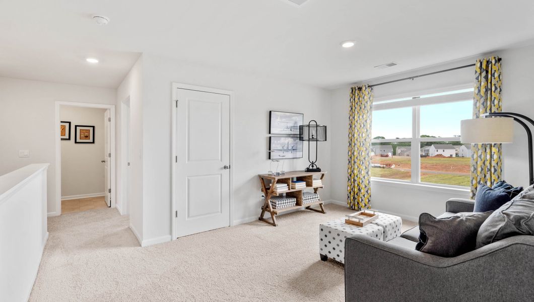 Representative furnished interior of a home built from the Hayden by D.R. Horton in Brookside Farms, Greer (Image 32).