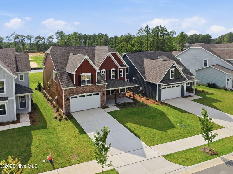 Front exterior of a new home in Legacy Lakes, Aberdeen, NC, highlighting curb appeal (Image 22).