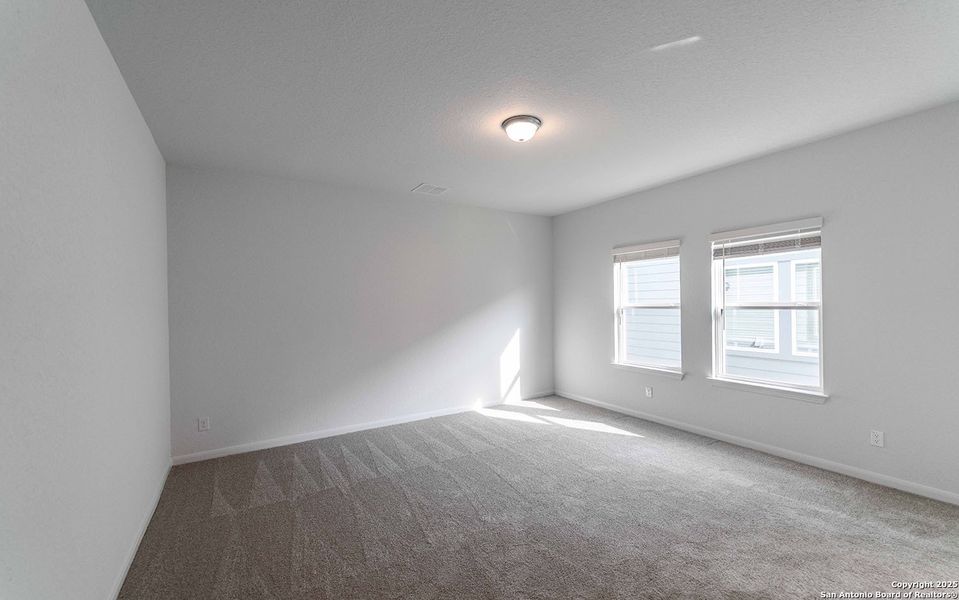 Spacious, unfurnished interior of a new home in Red Hawk Landing, San Antonio (Image 11).