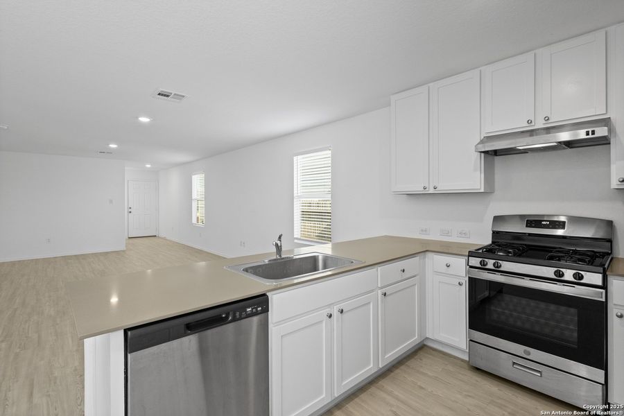 Furnished interior view inside a new home in Ruby Crossing: Cottage Collection, San Antonio (Image 5).