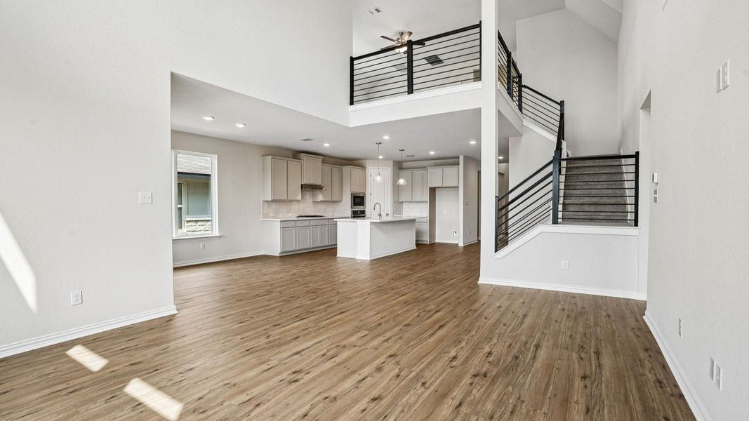 Second Floor Game Rooms with Sleek Staircase Design Overlooks Great Room