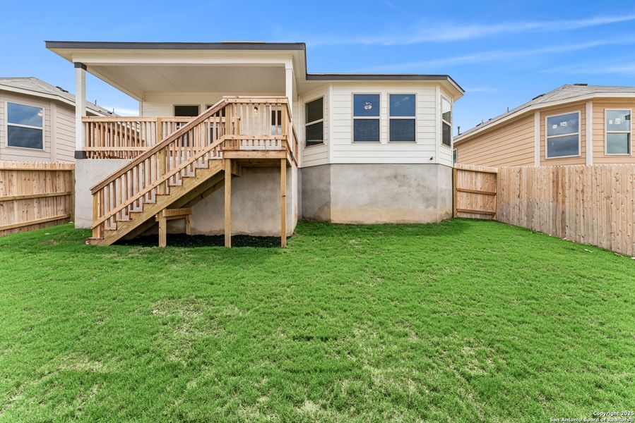 Front exterior of a new home in Mesquite Ridge, San Antonio, TX, highlighting curb appeal (Image 19). Front exterior of a new home in Mesquite Ridge, San Antonio, TX, highlighting curb appeal (Image 19).