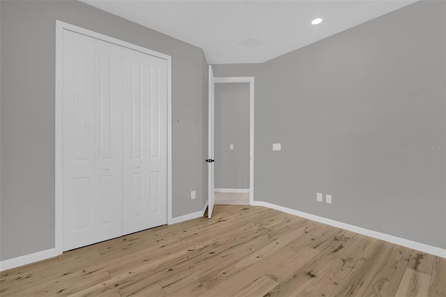Spacious, unfurnished interior of a new home in Seasons at Lakeside Forest, Tavares (Image 42).