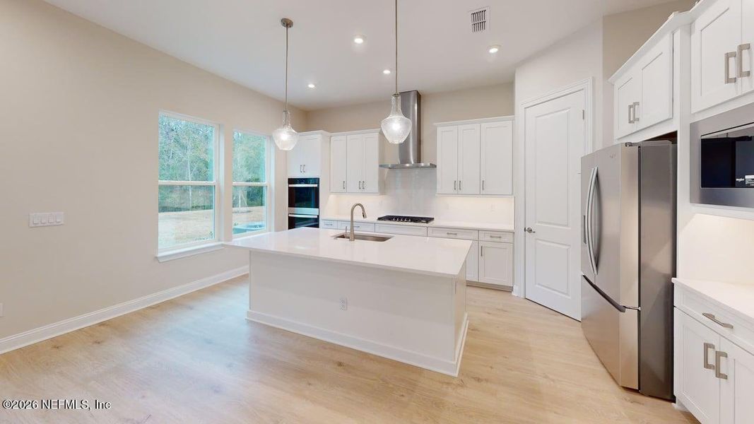 Furnished interior view inside a new home in RiverTown, St. Johns (Image 7).