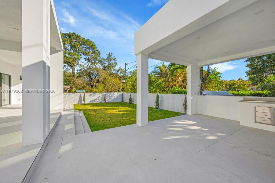 Exterior details and patio area of a home in , Miami Springs (Image 20).