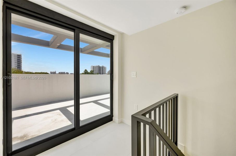 Exterior details and patio area of a home in , Miami (Image 3).