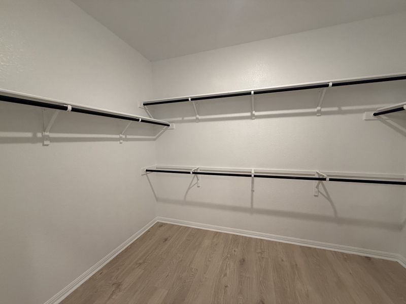 Spacious, unfurnished interior of a new home in The Hills of Bear Creek, Austin (Image 20).