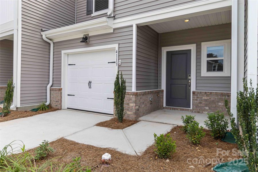 Front exterior of a new home in , Charlotte, NC, highlighting curb appeal (Image 20).