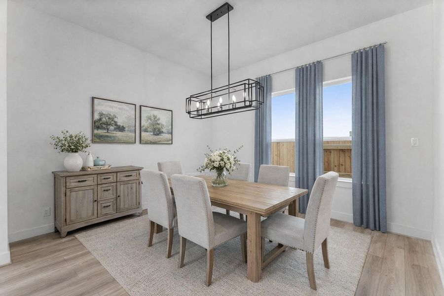 Elegant dining room with abundant natural light. Elegant dining room with abundant natural light.