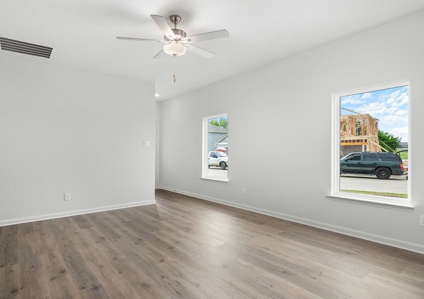 The family room has plenty of windows that let in great, natural light. The family room has plenty of windows that let in great, natural light.