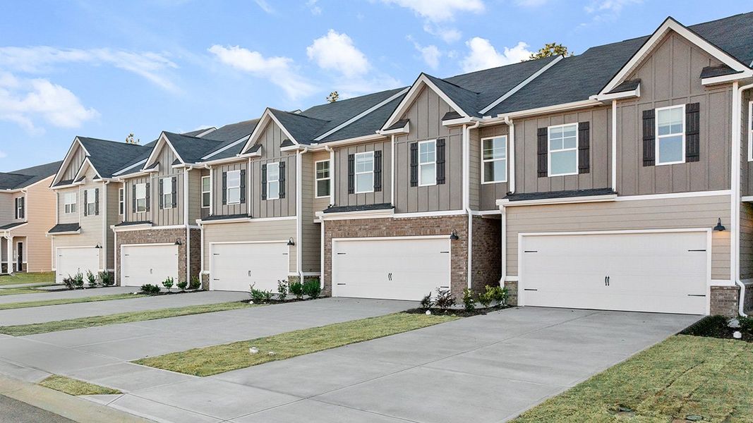 Front exterior of a new home in Laurel Park Townhomes, Hephzibah, GA, highlighting curb appeal (Image 2).