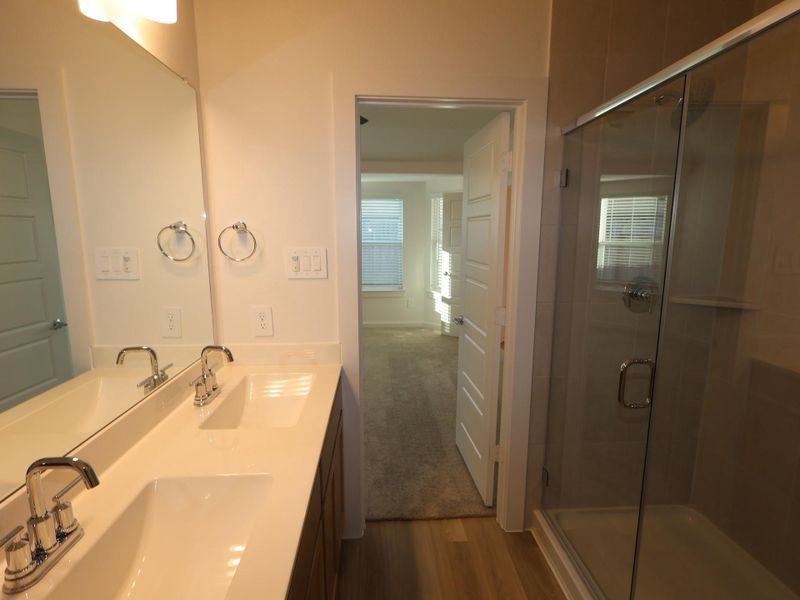 Furnished interior view inside a new home in Pinewood at Grand Texas, New Caney (Image 6).