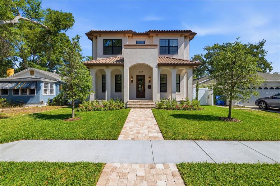 Front exterior of a new home in , St. Petersburg, FL, highlighting curb appeal (Image 28).