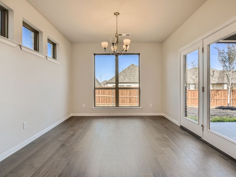 Plan 1533 Dining Area Representative Photo by American Legend Homes