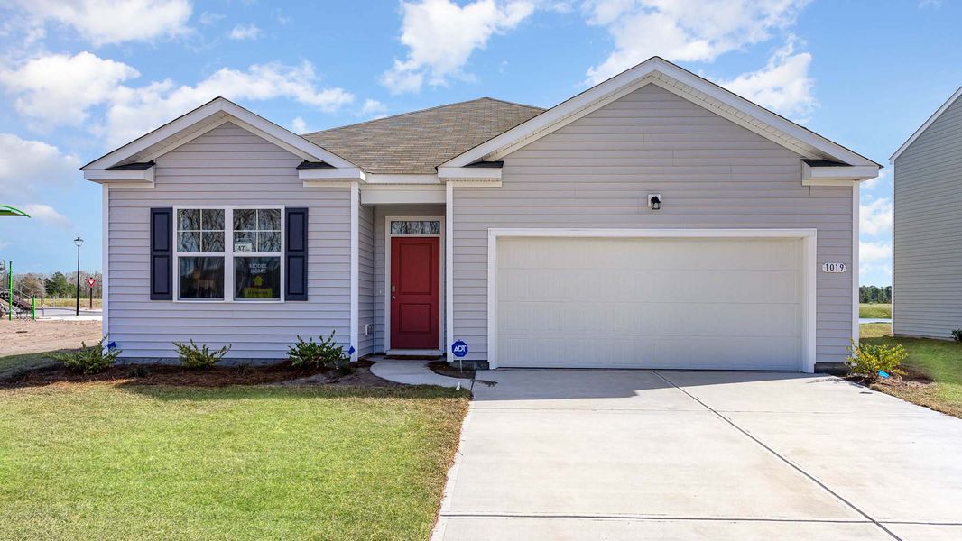 Representative exterior photo of a completed home built from the Cali by D.R. Horton in Pinewood Estates, Conway, SC (Image 14).