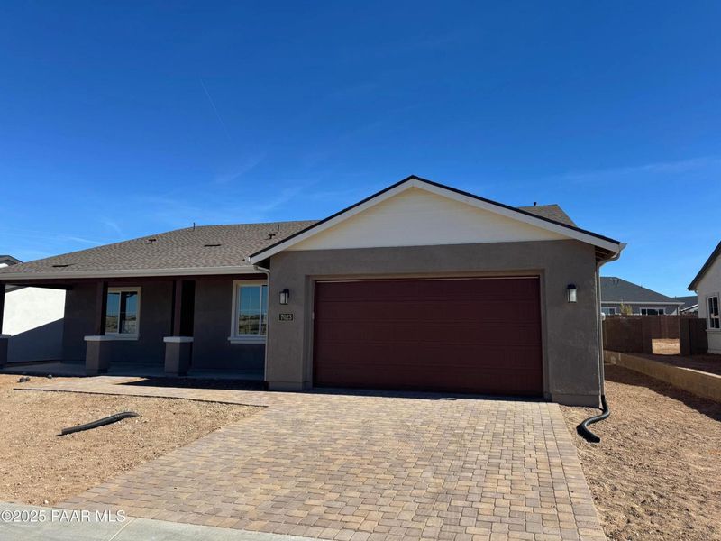 Front exterior of a new home in Westwood, Prescott, AZ, highlighting curb appeal (Image 1). Front exterior of a new home in Westwood, Prescott, AZ, highlighting curb appeal (Image 1).