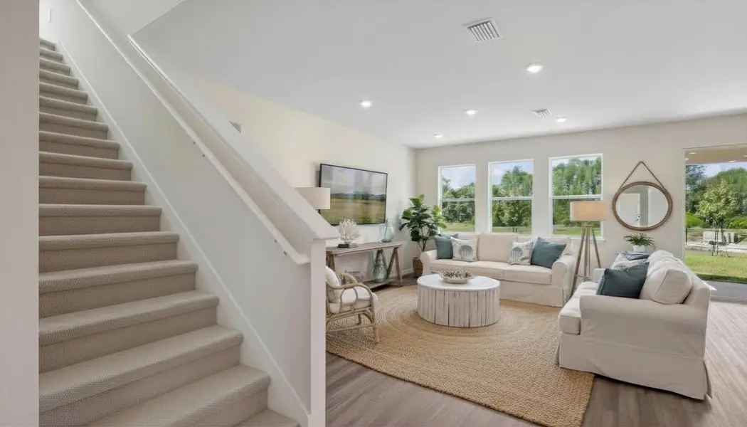 Representative furnished interior of a home built from the Coral by D.R. Horton in Deerbrook, Land O' Lakes (Image 5).