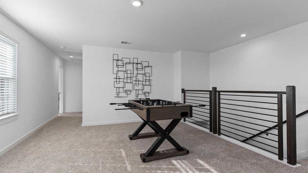 Furnished interior view inside a new home in Caldwell Crossing, Iowa Colony (Image 15). Furnished interior view inside a new home in Caldwell Crossing, Iowa Colony (Image 15).