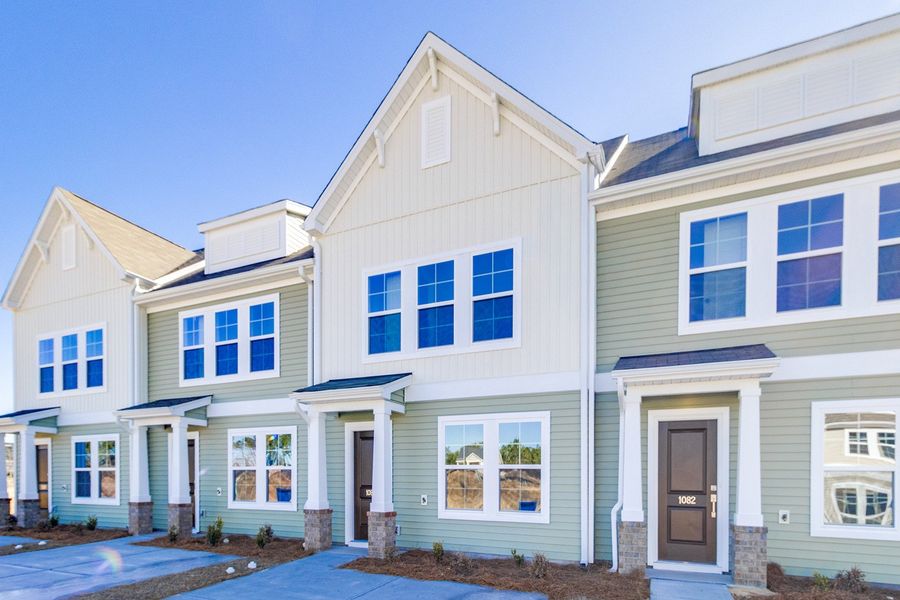 Front exterior of a new home in Astoria, Columbia, SC, highlighting curb appeal (Image 18).
