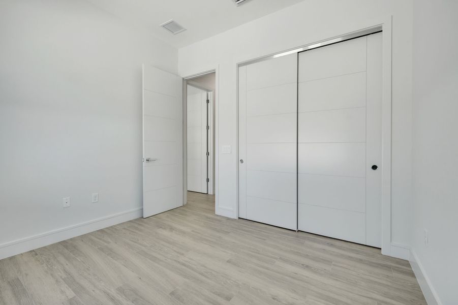 Representative unfurnished interior of a home built from the Marbella by ABD Development in Hampton Green at Providence, Davenport (Image 46).