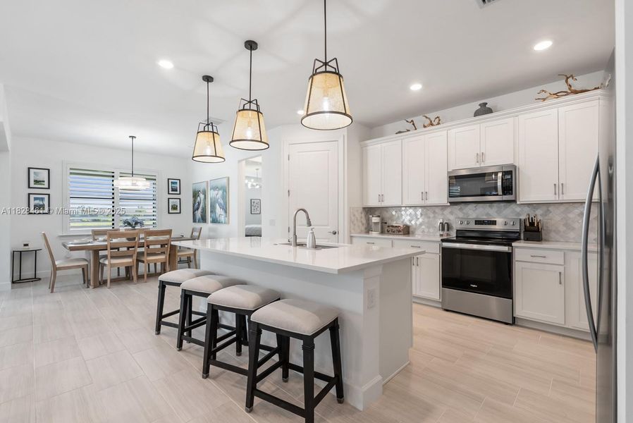 Furnished interior view inside a new home in Del Webb Naples, Ave Maria (Image 5).