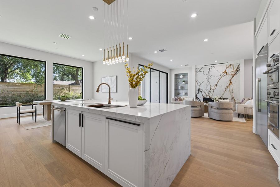 Additional kitchen view showcasing custom cabinetry and premium finishes throughout.
