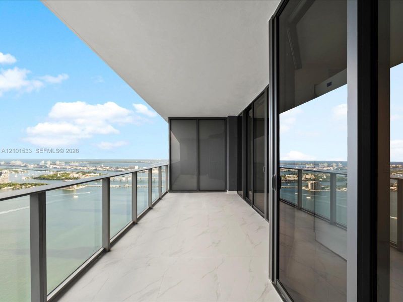 Exterior details and patio area of a home in Aria Reserve, Miami (Image 22).
