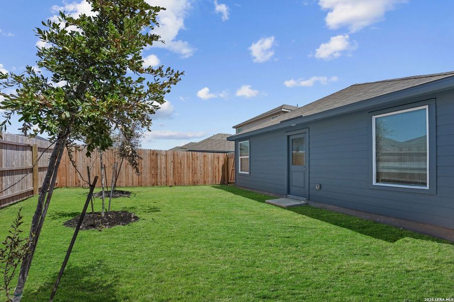 Exterior details and patio area of a home in Valle Sol, San Antonio (Image 2).