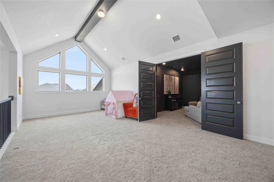 Generously sized and thoughtfully designed, this flexible entertainment space provides endless possibilities for recreation and relaxation.