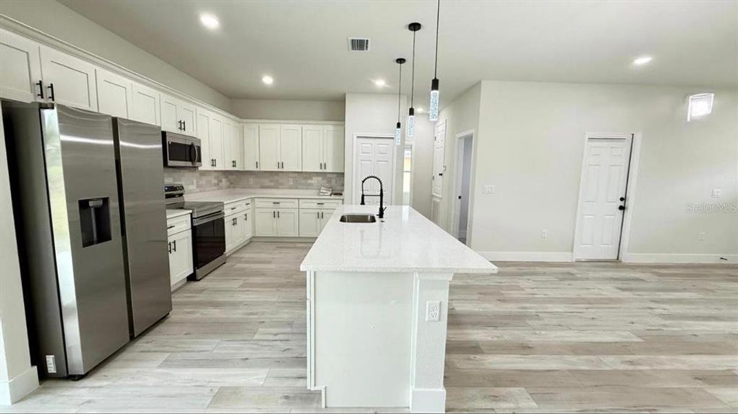 Furnished interior view inside a new home in , Ocala (Image 7).