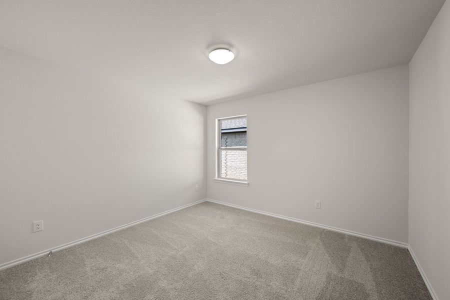 Representative exterior photo of a completed home built from the Cheyenne by Impression Homes in Baker Farms, Cleburne, TX (Image 17).