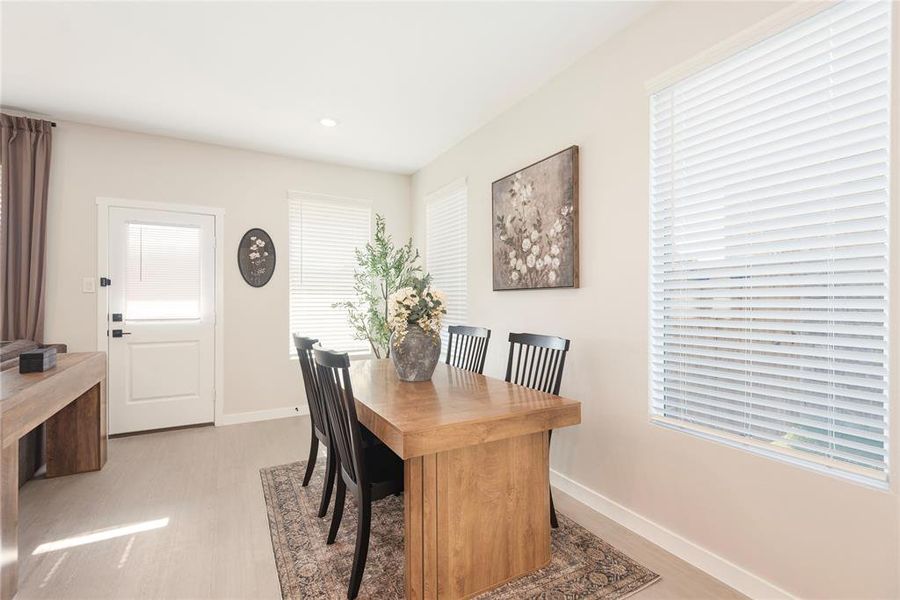 Light-toned wood-finish flooring complements the neutral wall color Light-toned wood-finish flooring complements the neutral wall color