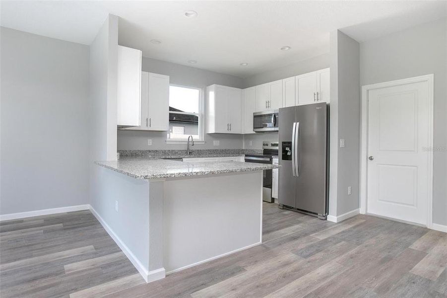 Furnished interior view inside a new home in , Deltona (Image 6). Furnished interior view inside a new home in , Deltona (Image 6).