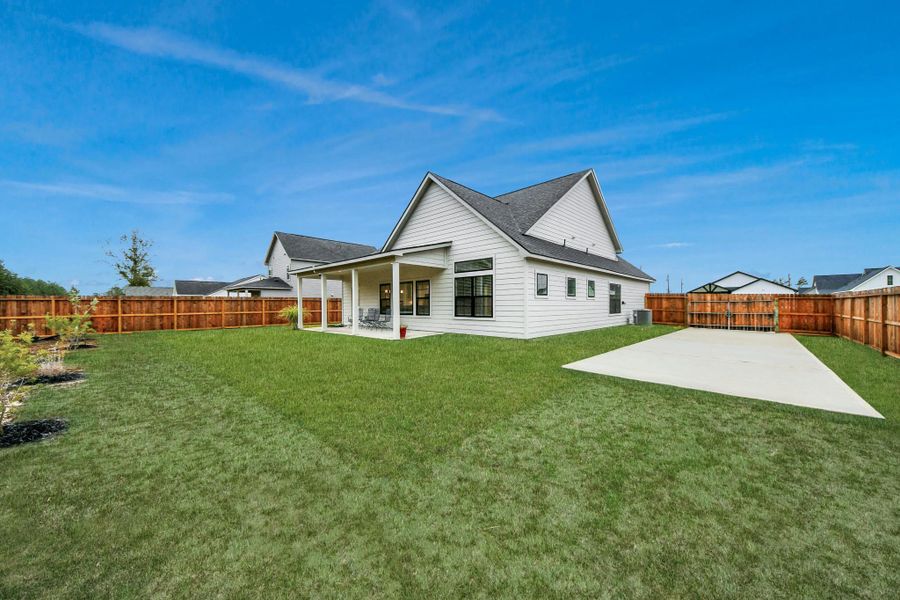 Exterior details and patio area of a home in Spring Branch Crossing, Conroe (Image 21). Exterior details and patio area of a home in Spring Branch Crossing, Conroe (Image 21).