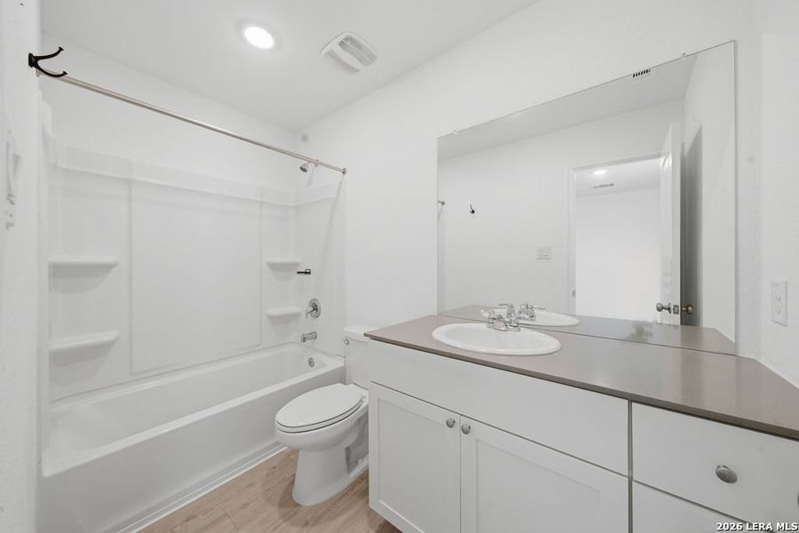 Furnished interior view inside a new home in Aston Park, San Antonio (Image 11).