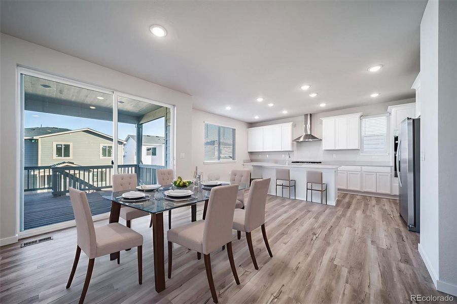 Furnished interior view inside a new home in Floret Collection at Alder Creek, Parker (Image 8).
