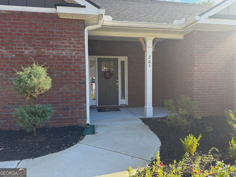 Exterior details and patio area of a home in Carson's Walk, Macon (Image 3).