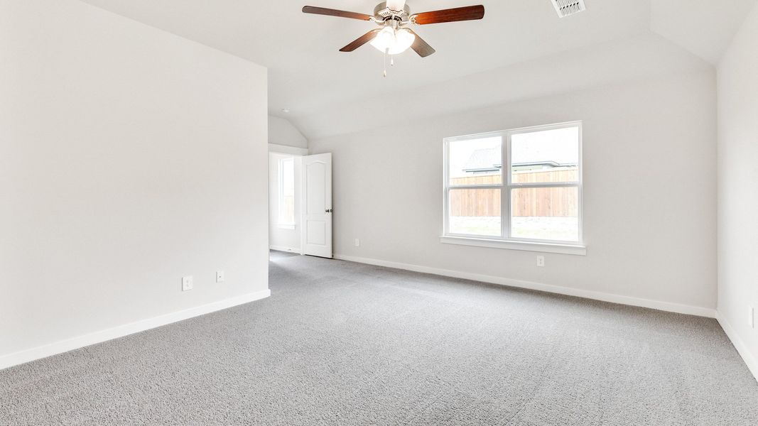 Representative furnished interior of a home built from the Meyerson by Brightland Homes in Sunterra, Katy (Image 12).