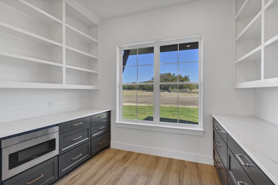 Furnished interior view inside a new home in Oak Water Ranch, Granbury (Image 8).