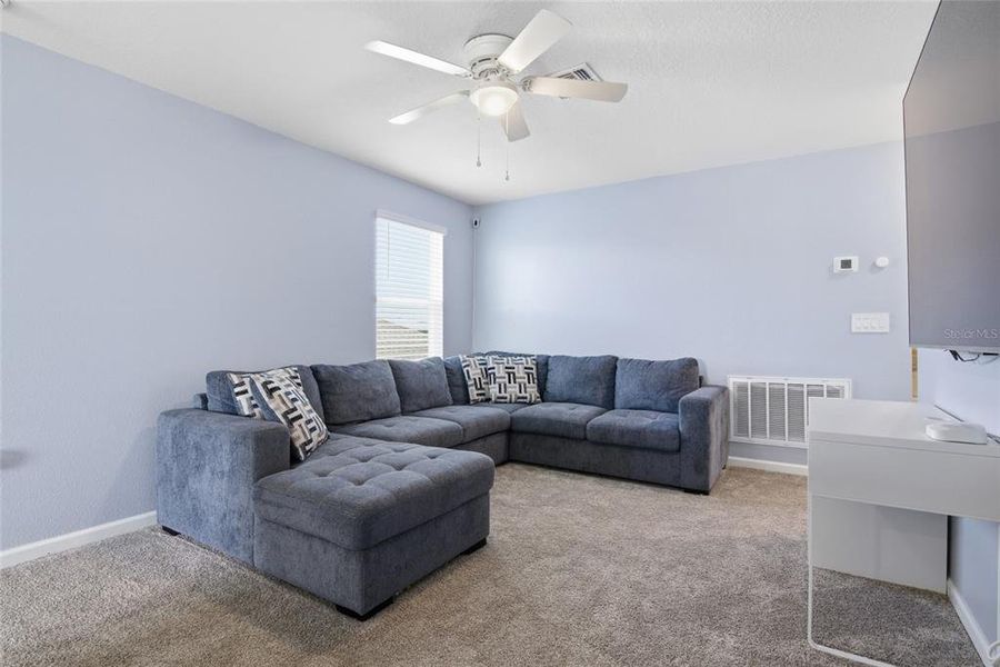 Furnished interior view inside a new home in Wellness Ridge, Clermont (Image 35).