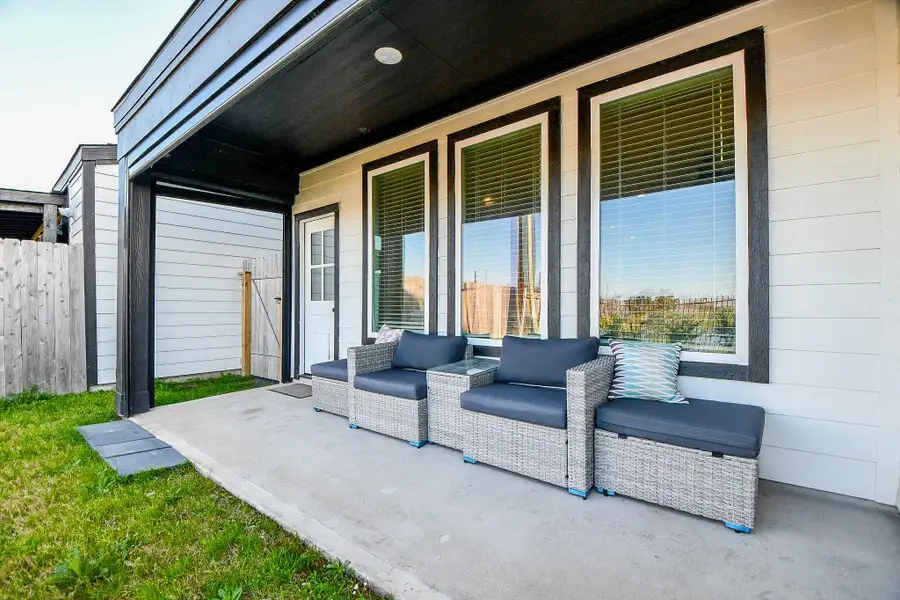 Exterior details and patio area of a home in City Gate North, Houston (Image 20).