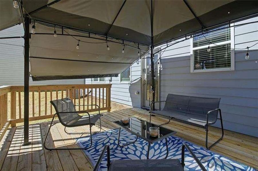 Exterior details and patio area of a home in Tell River, Atlanta (Image 31). Exterior details and patio area of a home in Tell River, Atlanta (Image 31).